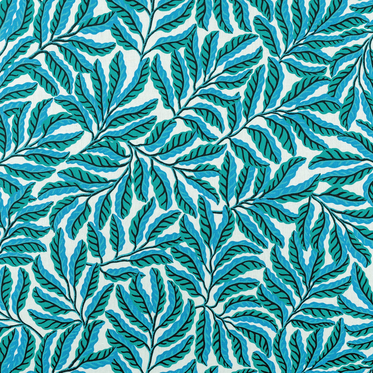 Pattern of green leaves on a blue and white background