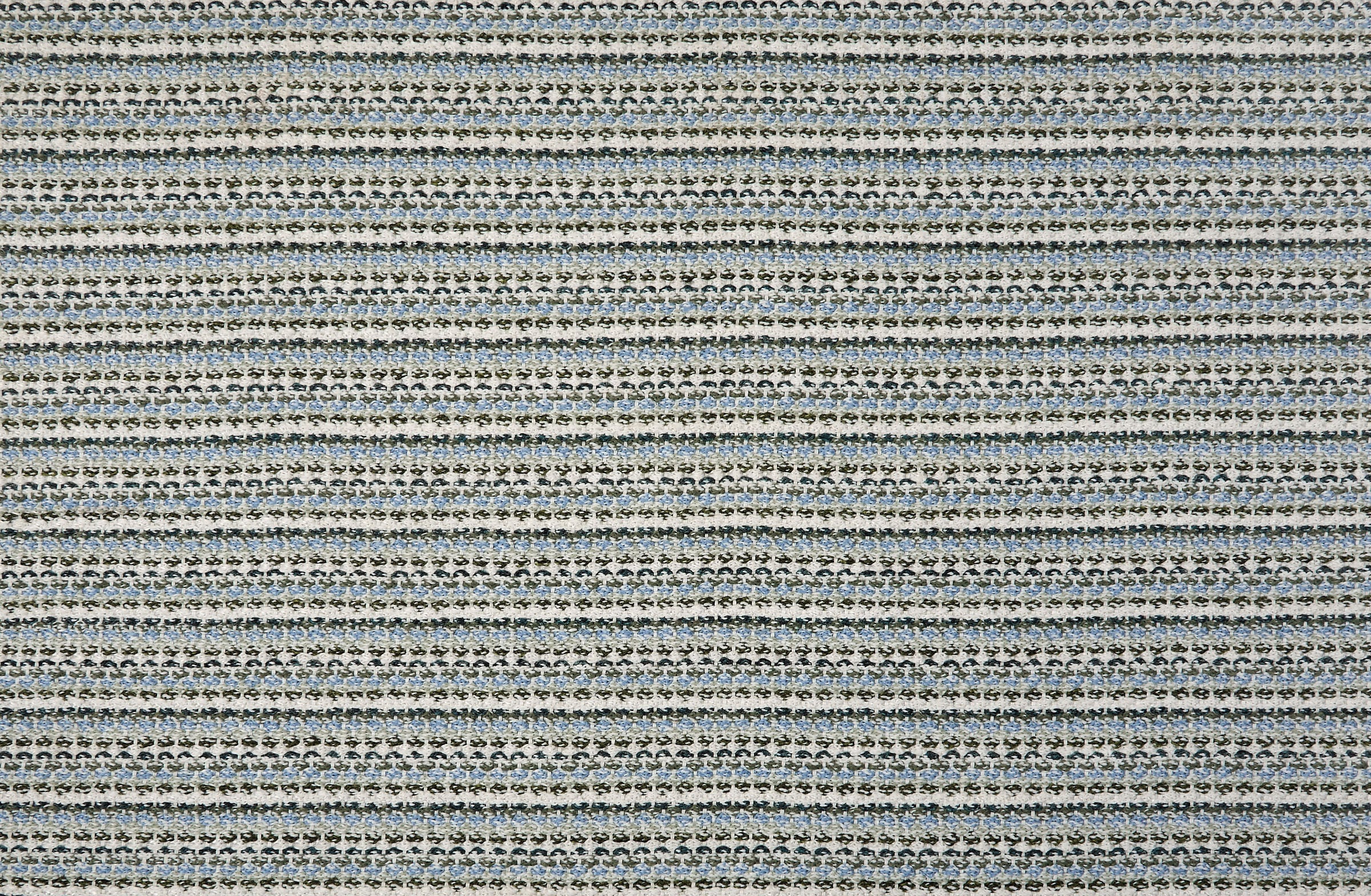 Broadloom carpet with textured stripe in shades of blue and white. 