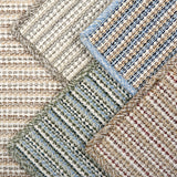 Various broadloom carpet samples in a textural stripe design.