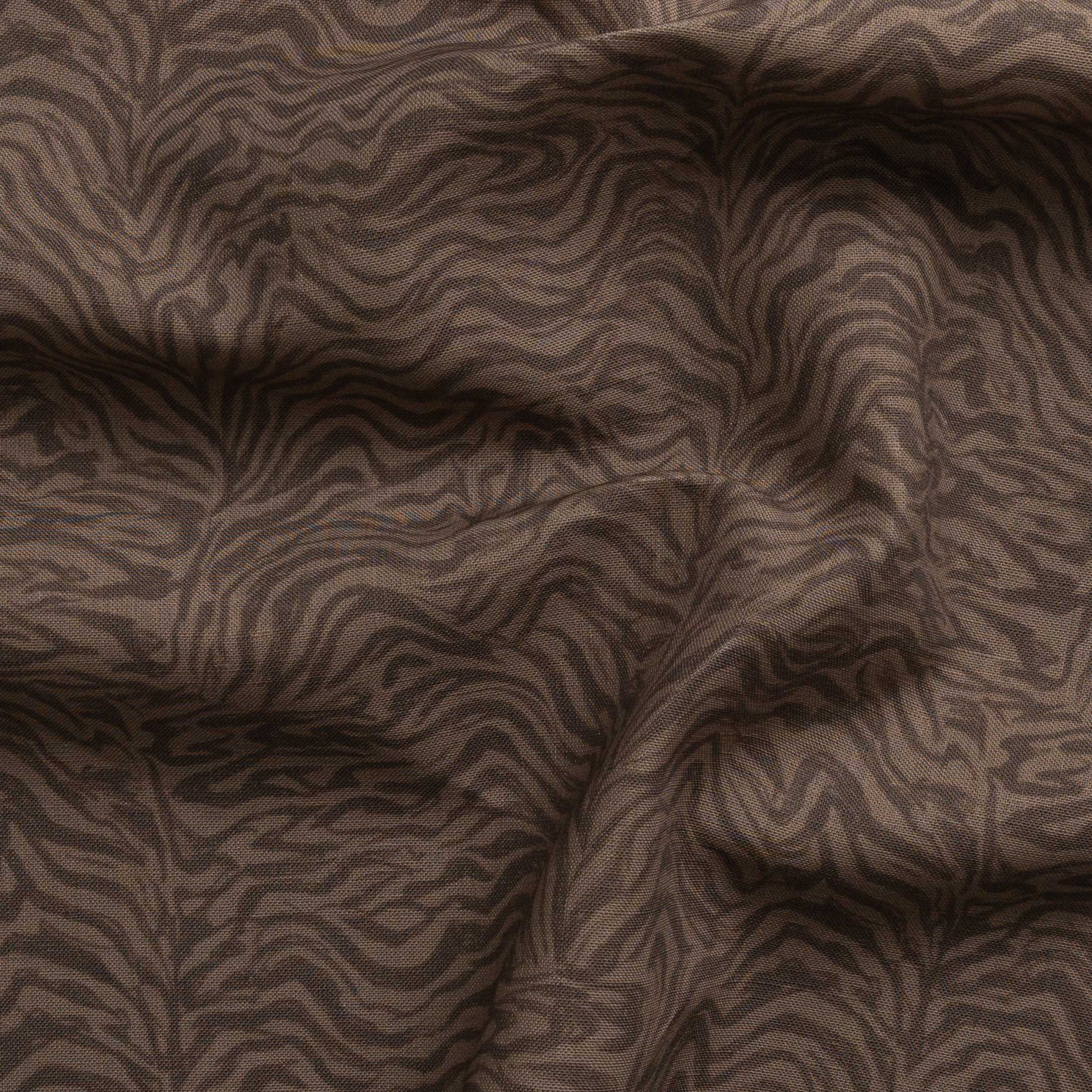 Detail of gently draped printed fabric with watercolor swirling stripe pattern in tonal warm brown.