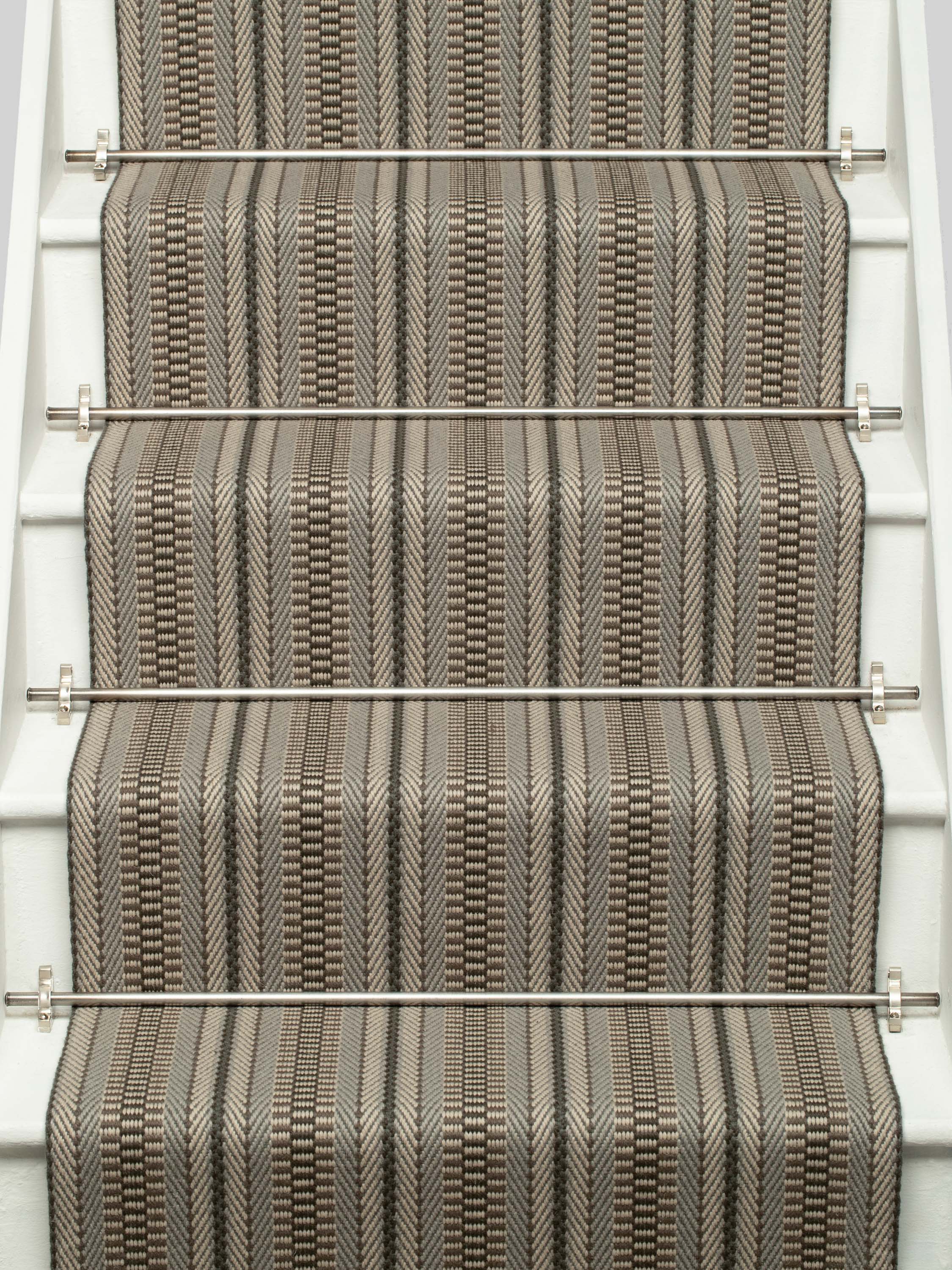 Striped flatweave runner in grey on white staircase