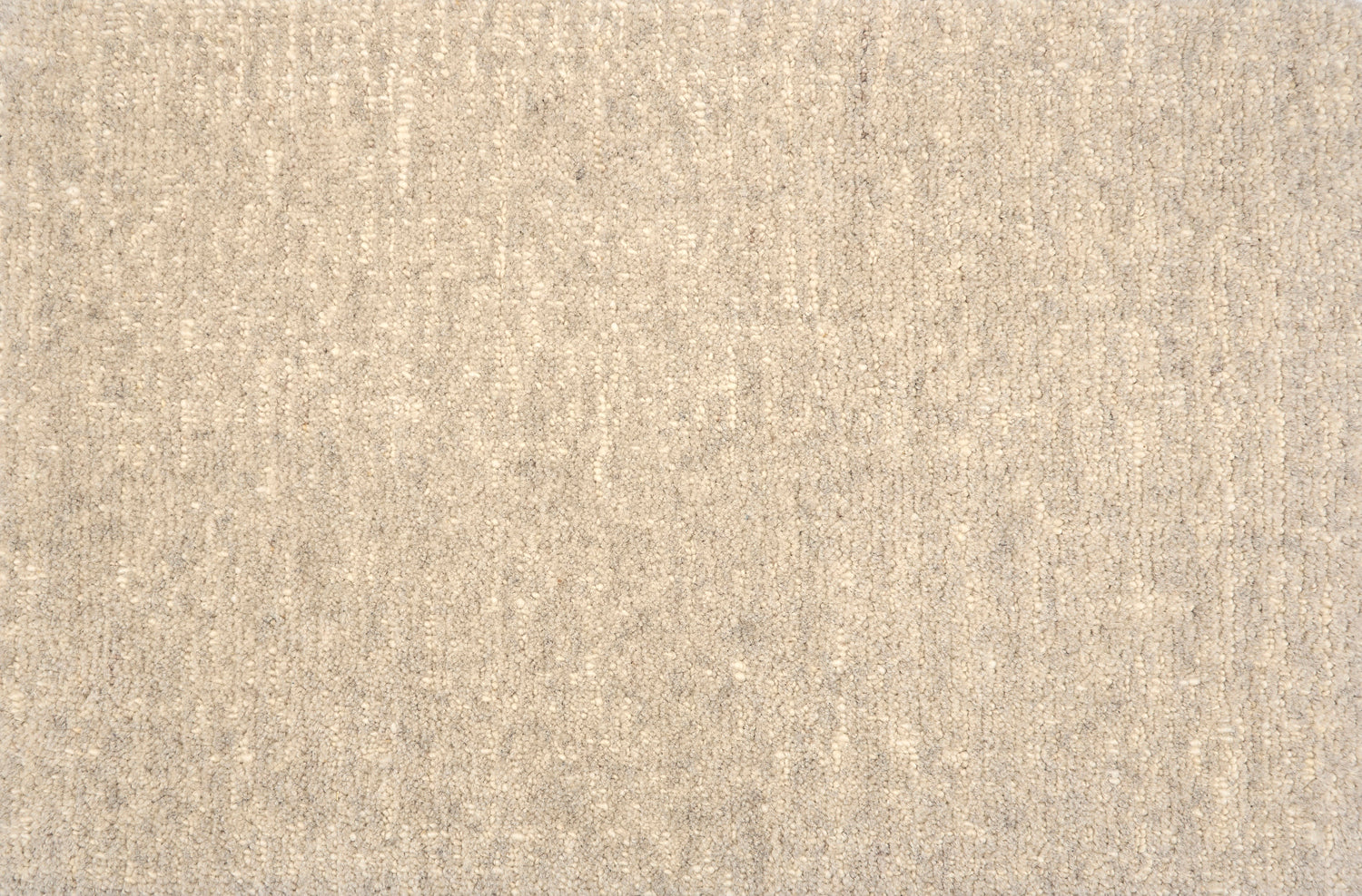 Broadloom carpet with subtle texture in soft grey.