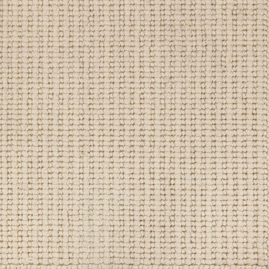 Broadloom carpet with a textural rib in cream