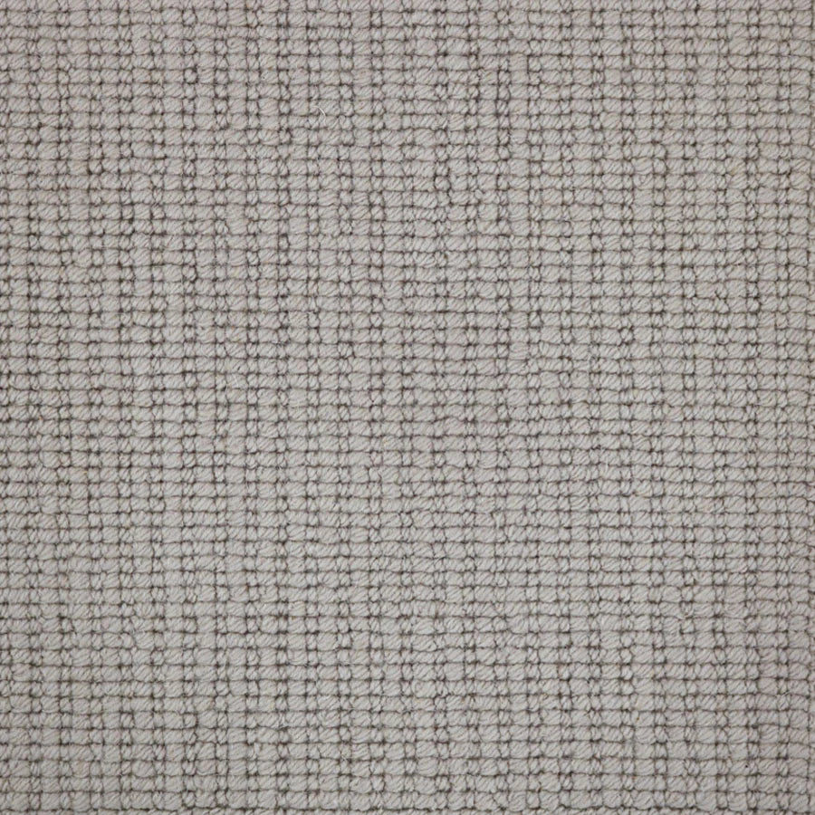 Broadloom carpet with a textural rib in grey,