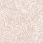 Detail of wallpaper in a textural painted print in blush on a cream field.
