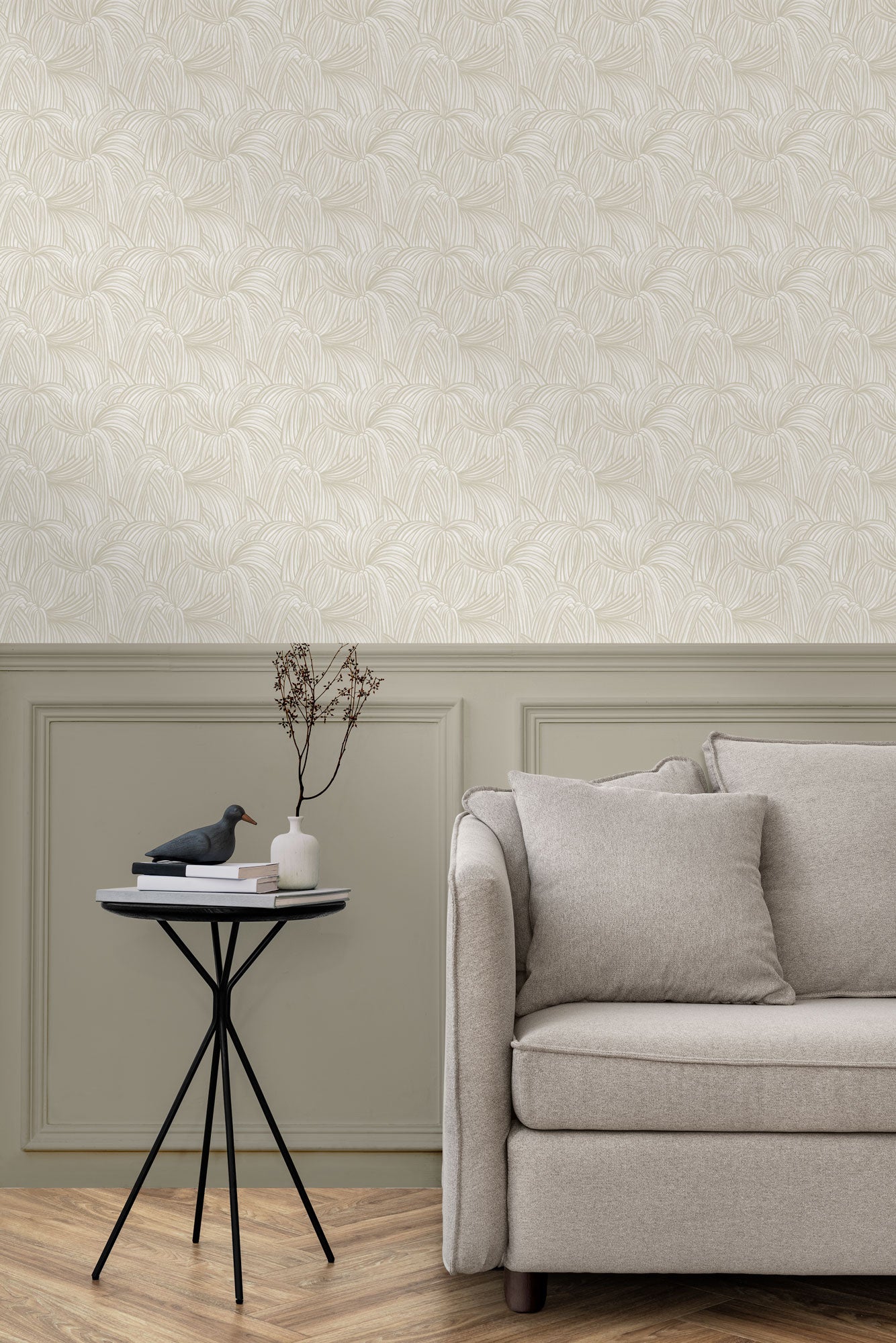 Living room with a wall papered in a textural painted print in tan on a cream field.