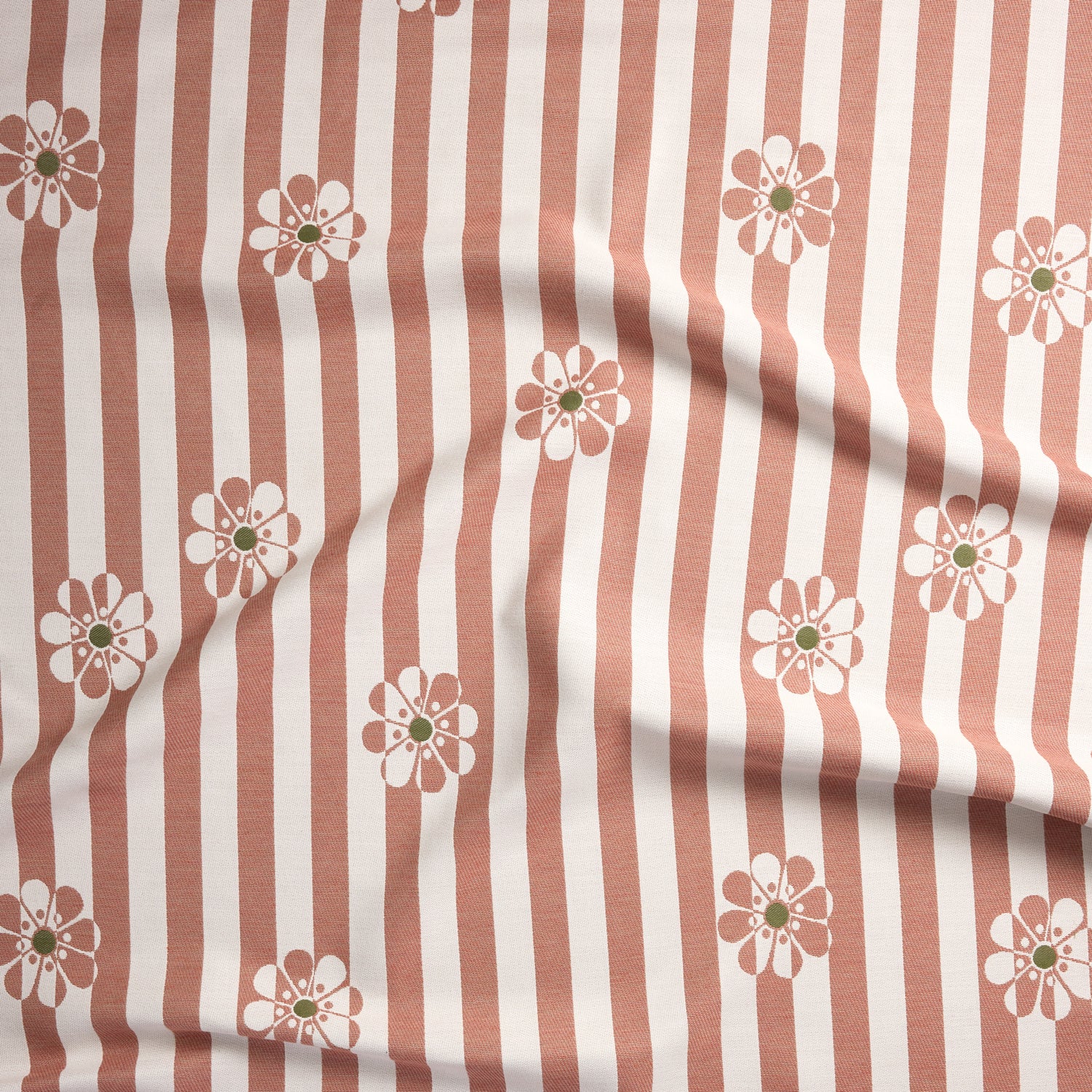 A close-up of a fabric pattern featuring vertical dusty rose and white stripes with scattered daisy-like flowers in white, dusty rose, and olive green.