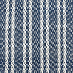 Indoor-Outdoor rug in a woven stripe in white and blue. 
