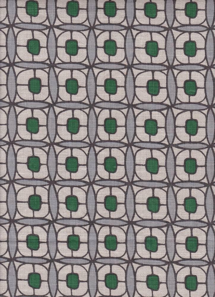 Detail of fabric in a geometric lattice print in green, blue-gray and brown.