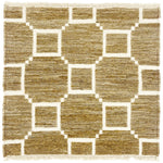 Woven rug swatch with a ivory lattice pattern on a taupe field with ivory fringe edges at top and bottom