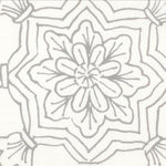 Detail of fabric in a floral medallion print in gray on a white field.