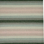 A flatweave rug with stripes in 3 shades of green, 2 shades of pale pink, and ivory.