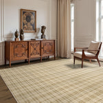 Living room with wooden sideboard, chair, and decorative items on a patterned rug.