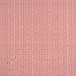 Patterned fabric swatch with a geometric design on a red background