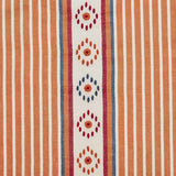 Detail of fabric in a global stripe print in shades of orange, blue and red on a cream field.