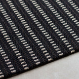Striped flatweave runner in black and white