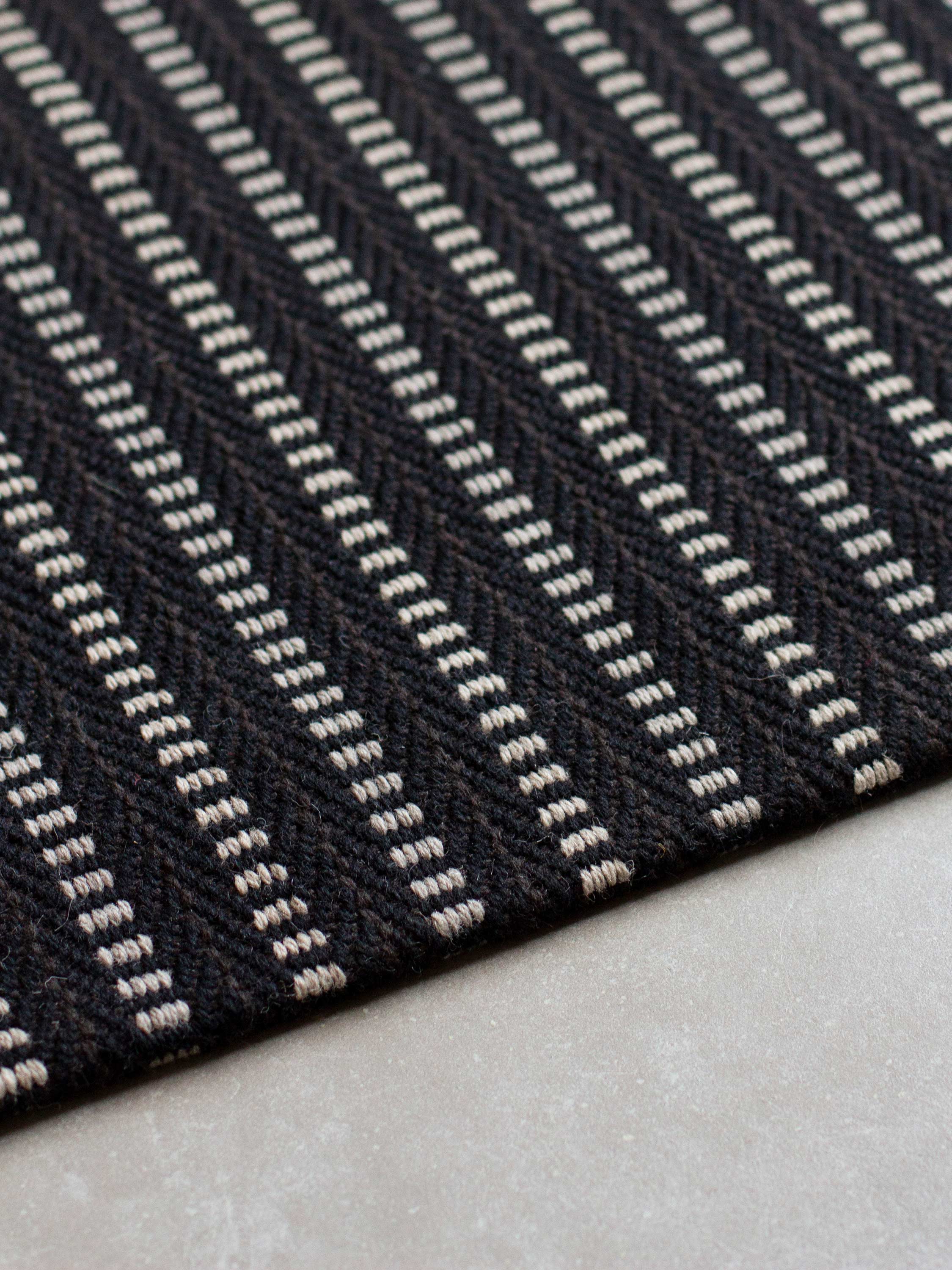 Striped flatweave runner in black and white