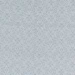 Textured fabric with a diamond pattern in blue on white. 