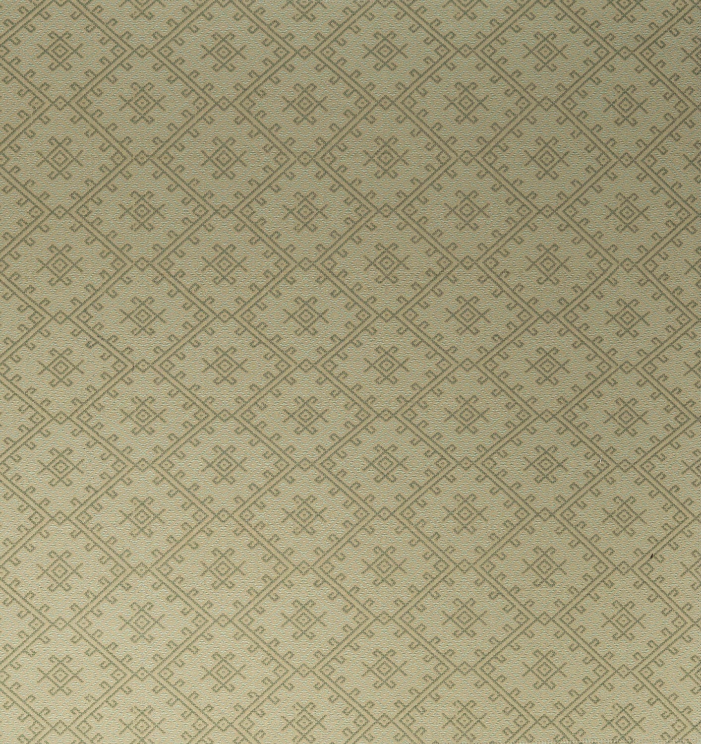 Green patterned fabric with a geometric design