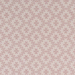 Textured fabric with a diamond pattern in red on white. 