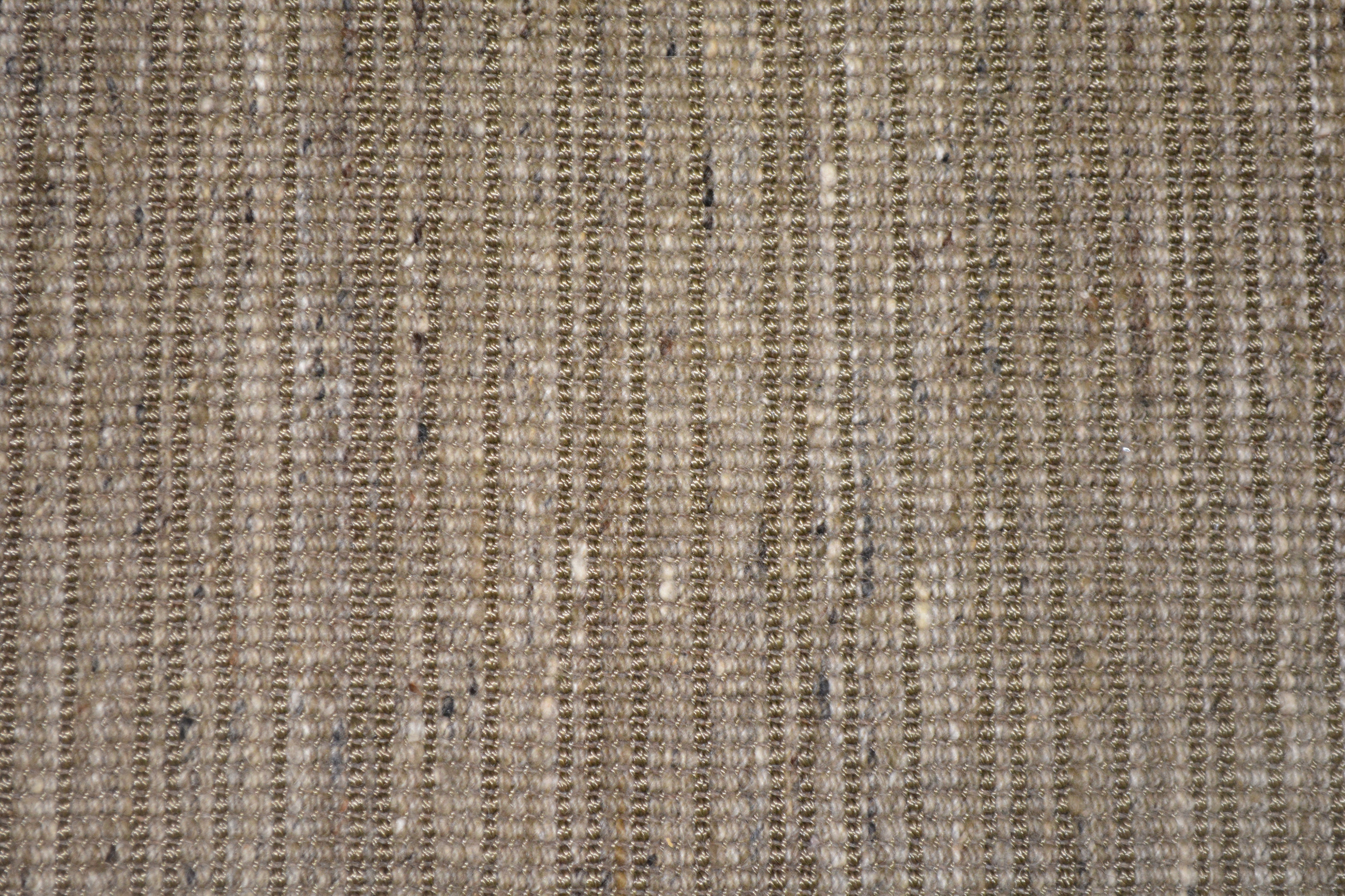 Textured broadloom carpet in taupe