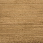 Broadloom carpet with ribbed and cut pile stripe in tan.