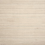 Broadloom carpet with ribbed and cut pile stripe in ivory.