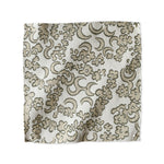 Woven fabric painterly botanical lace pattern in beige. 