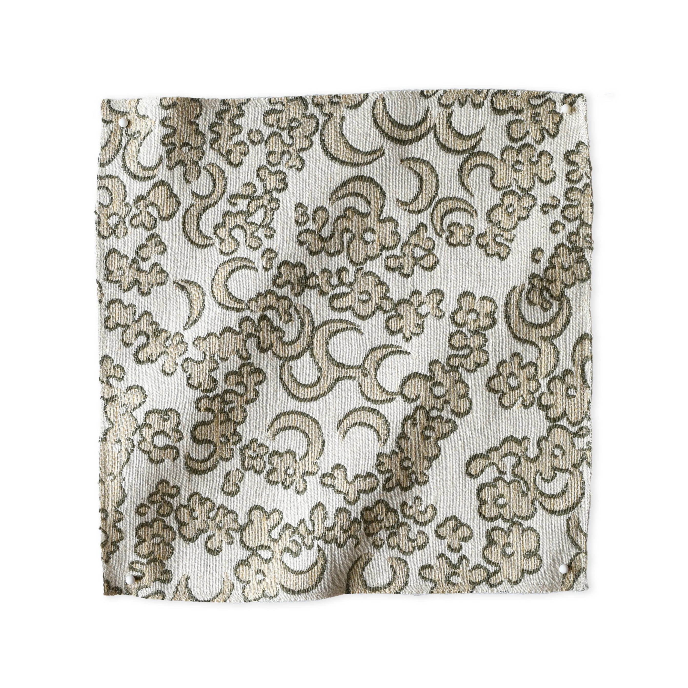 Woven fabric painterly botanical lace pattern in beige. 