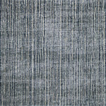 Broadloom carpet in subtle textural weave in blue. 