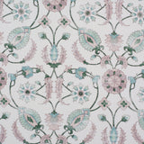 Detail of fabric in a floral paisley print in shades of pink and green on a cream field.