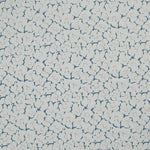 Fabric in a minimal floral print in pink and navy on a gray field.