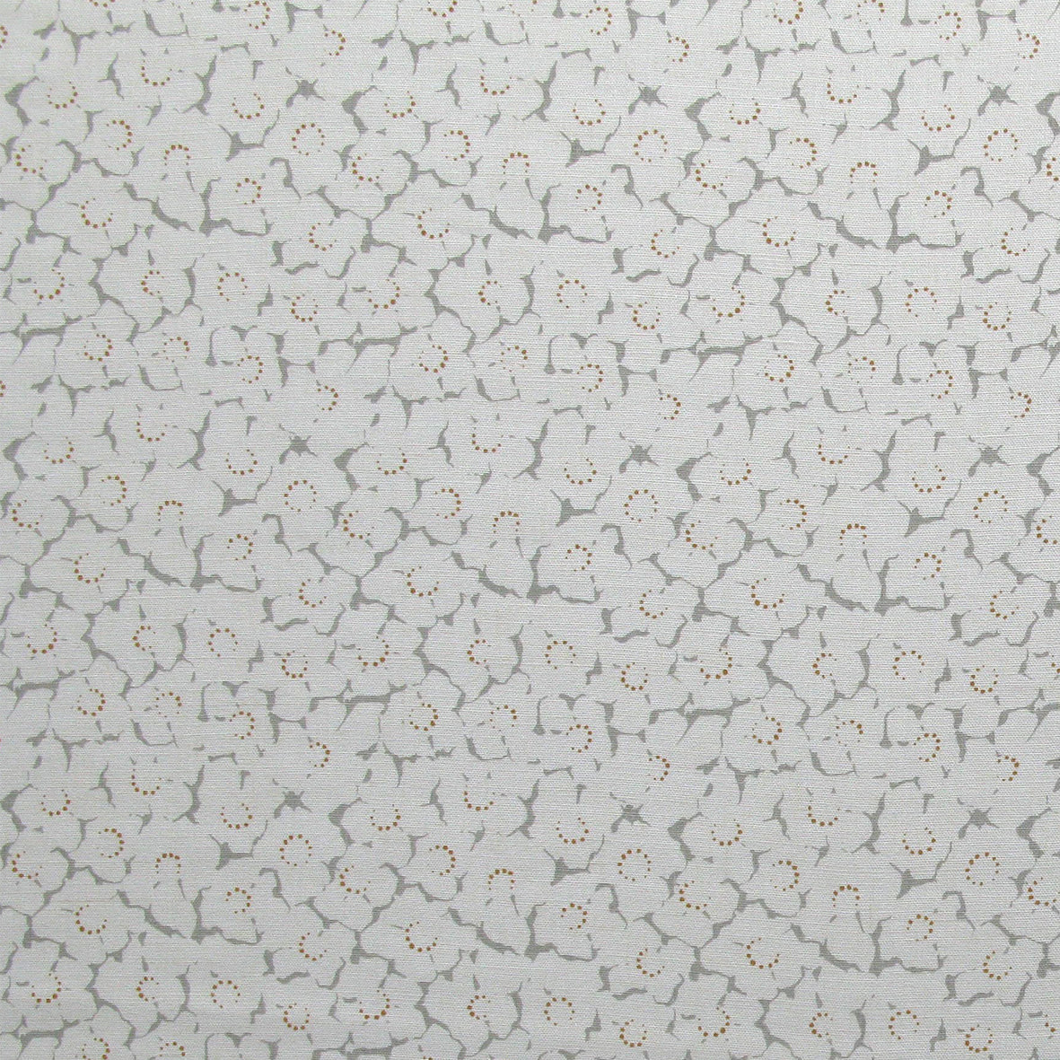 Fabric in a minimal floral print in red and gray on a light gray field.