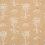 Detail of fabric in a playful palm tree print in tan and white on a light yellow field.
