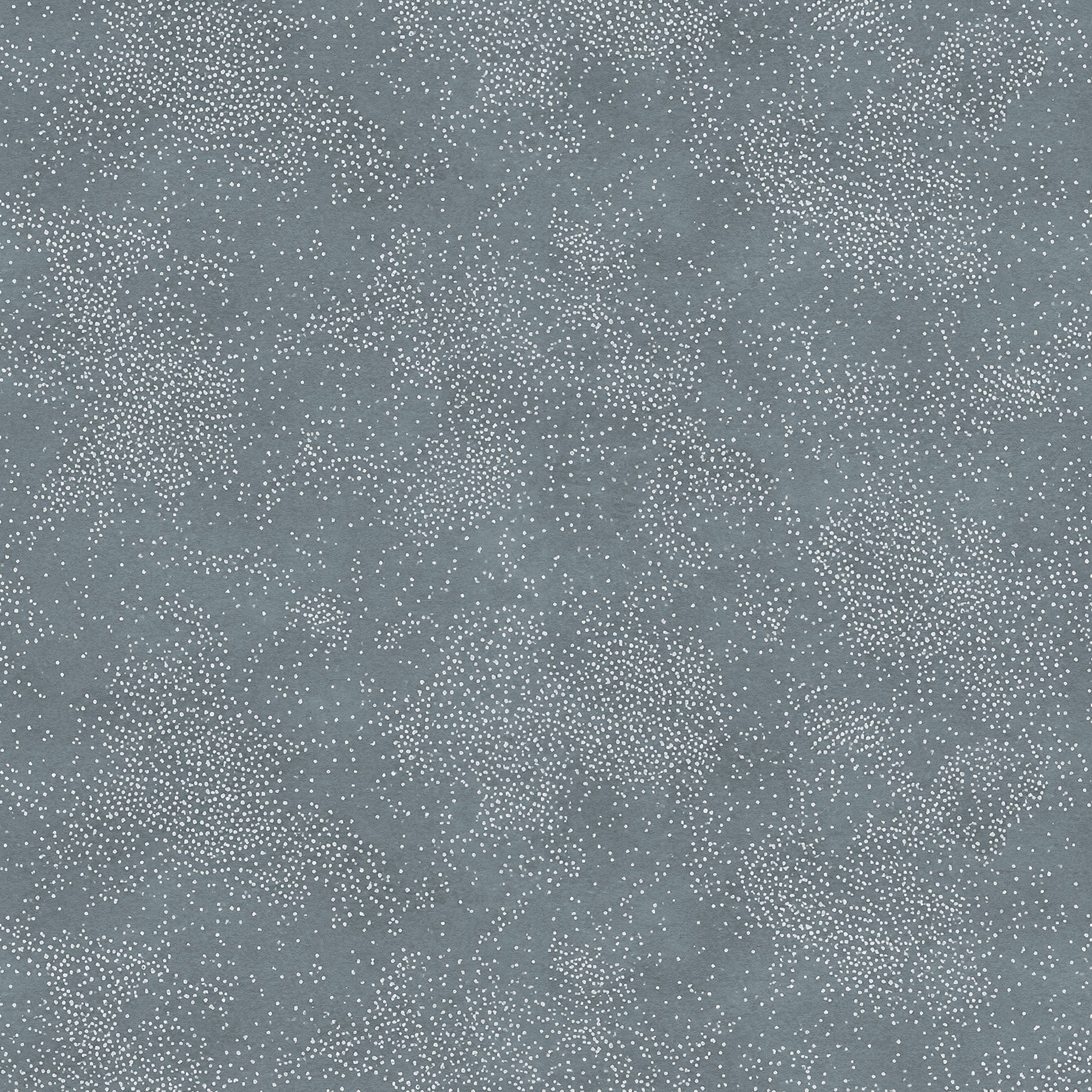 Detail of printed wallpaper with a white celestial dotted pattern on a cool blue background. 