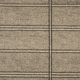 Broadloom carpet in large scale plaid in shades of grey and taupe.
