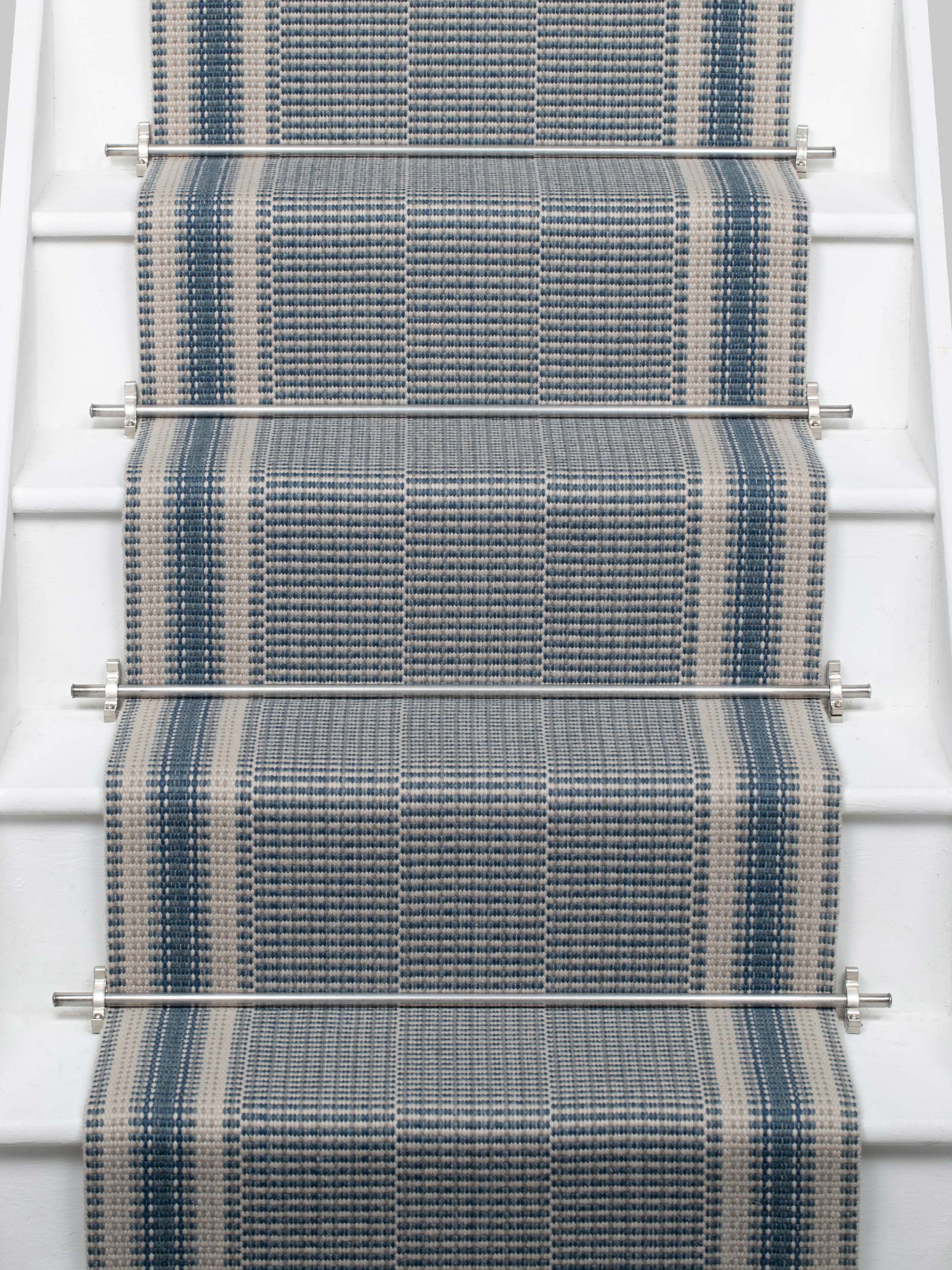 Striped flatweave runner in blue on white staircase 