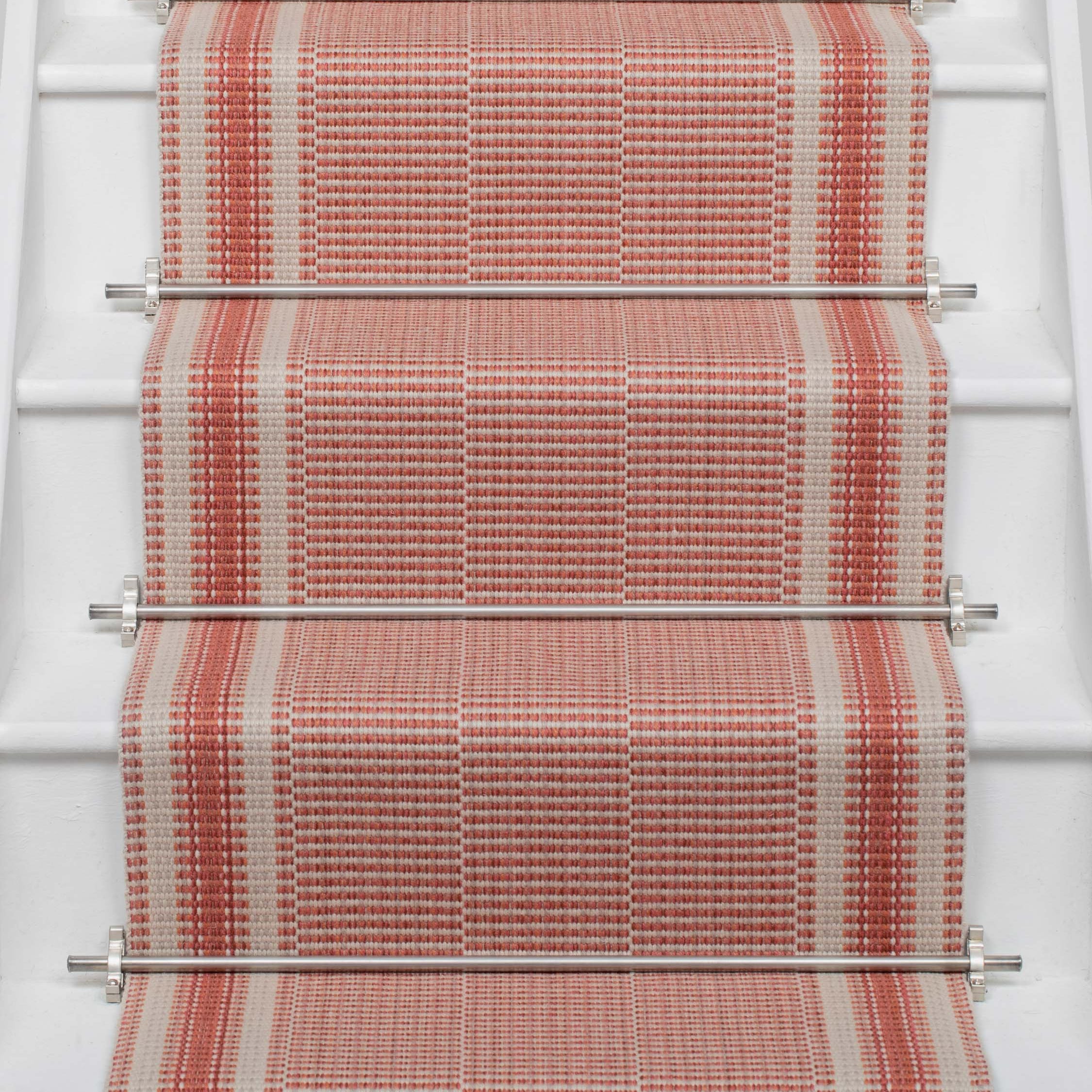 Striped flatweave runner in red on white staircase