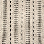 Broadloom carpet swatch in a stripe pattern in a cream black design