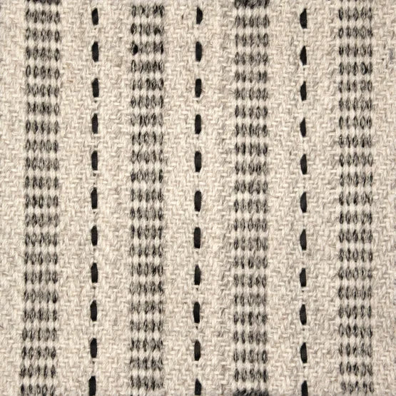 Broadloom carpet swatch in a stripe pattern in a cream black design