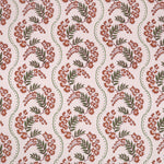 Floral pattern with scrolling stripes in green and orange. 