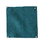 Pinned swatch of woven fabric in teal