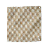 Pinned swatch of woven fabric in beige. 