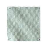 Pinned swatch of woven fabric in light aqua