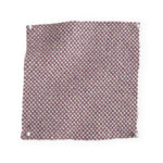 Pinned swatch of woven fabric in pale purple. 