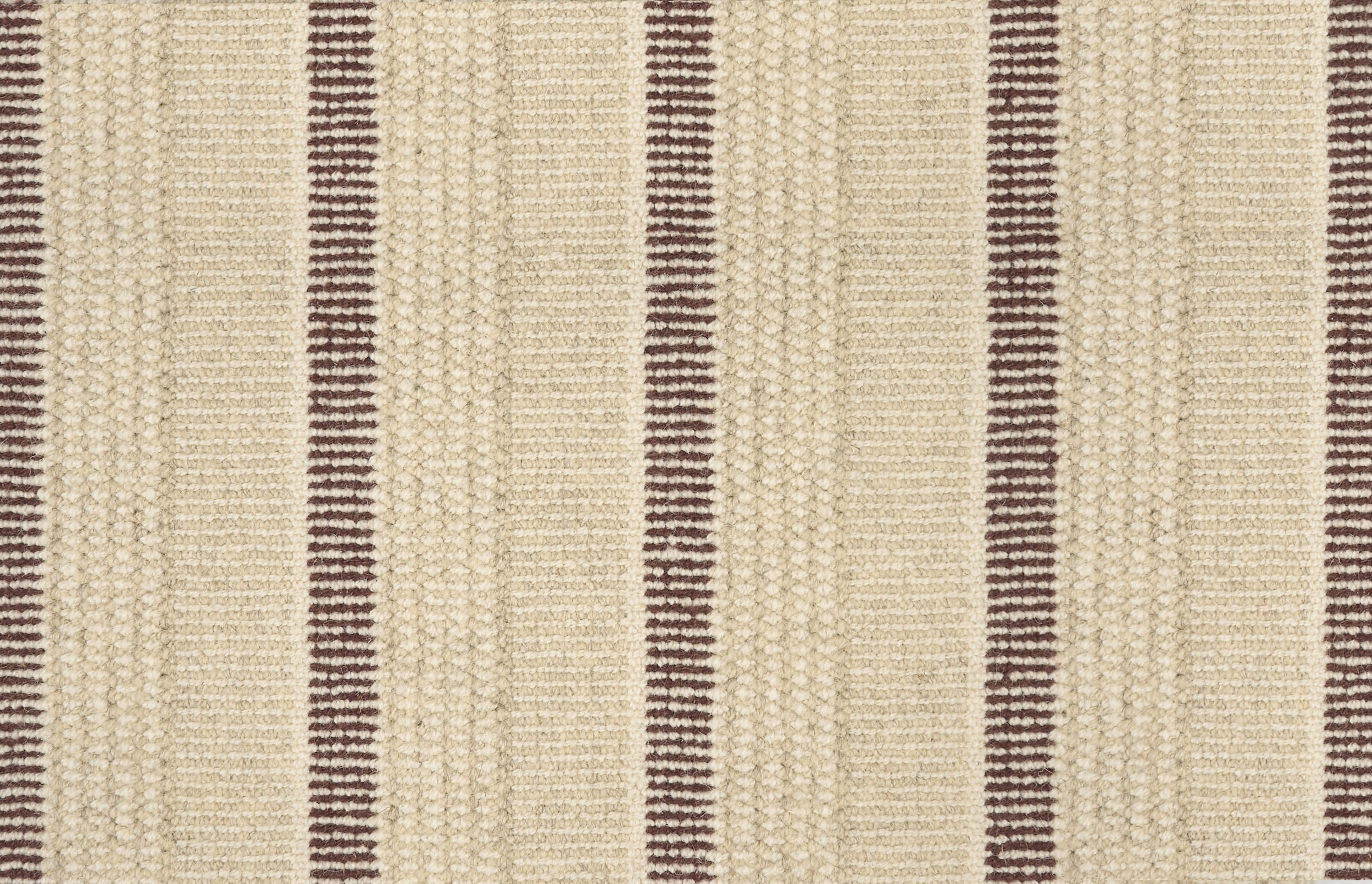 Textured broadloom carpet in beige with stripes in chocolate brown.  