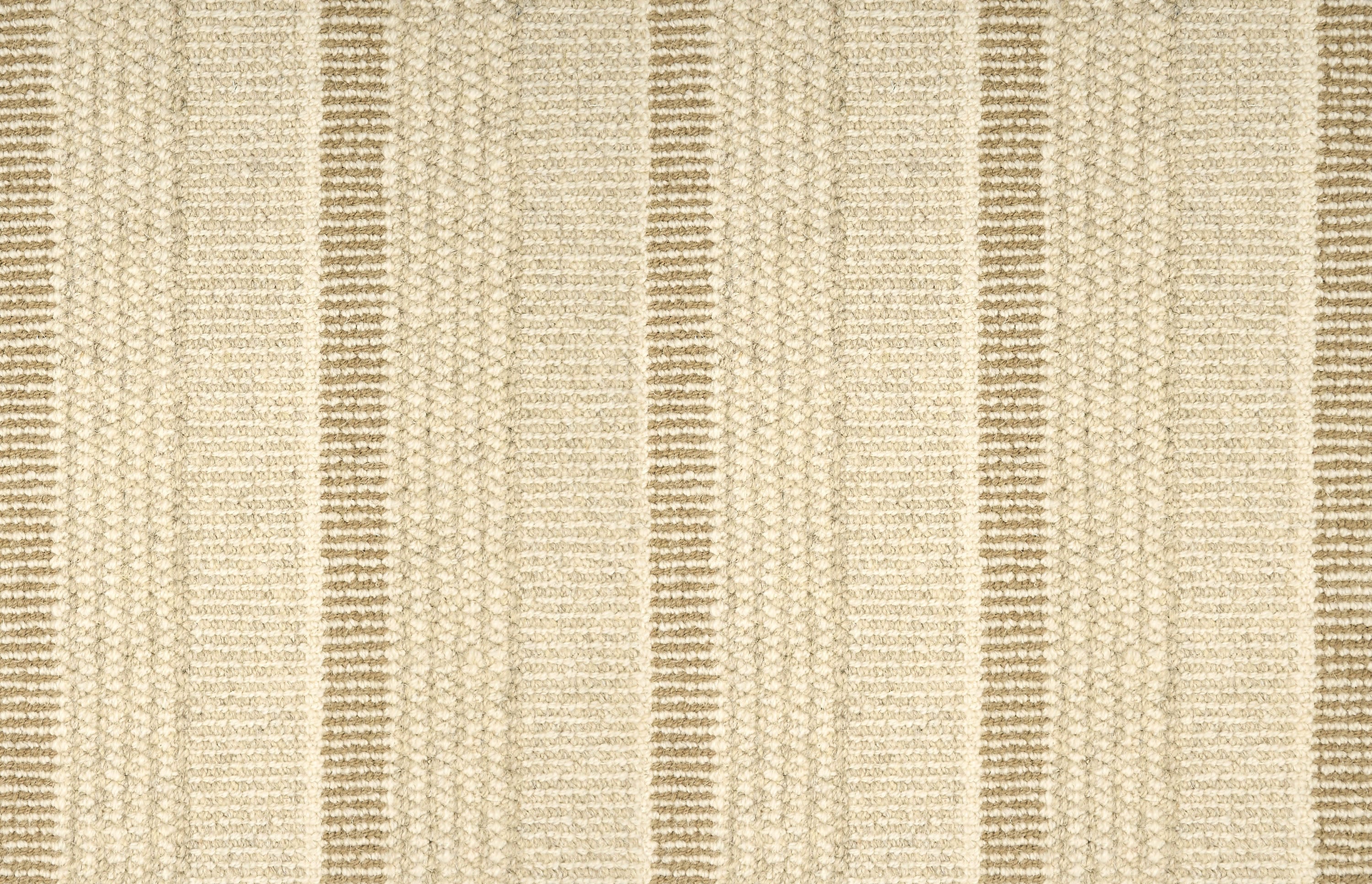 Textured broadloom carpet in beige with stripes in taupe.