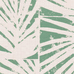 Detail of fabric in a botanical grid print in turquoise on a white field.