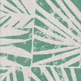 Detail of fabric in a botanical grid print in turquoise on a white field.