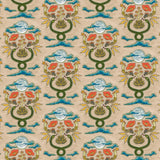 Fabric in a playful snake, plant and moon print in jewel tones with rhinestone accents on a tan field. 